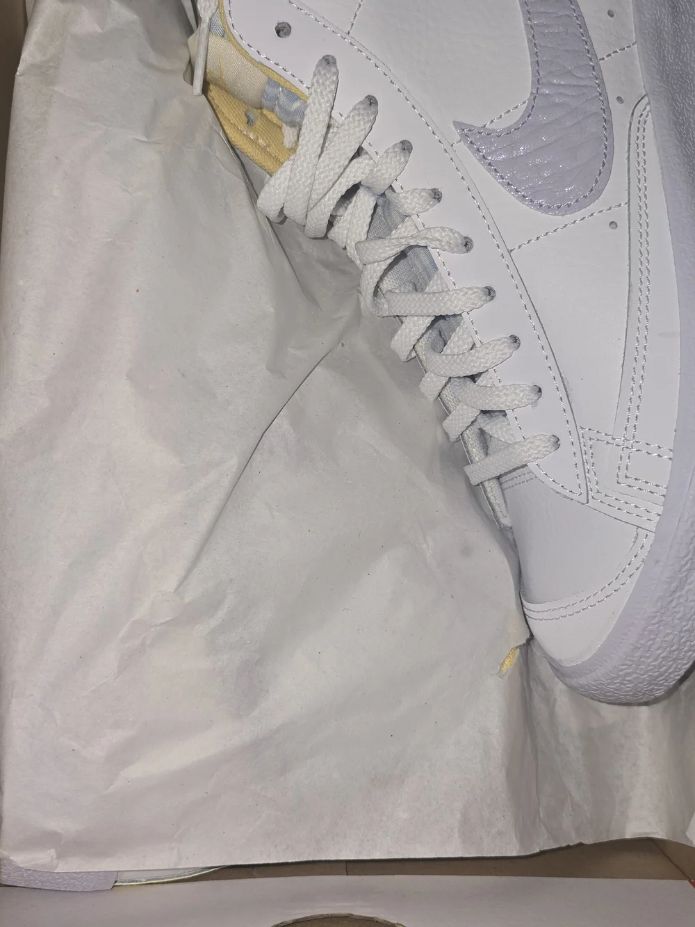 Nike White High-Top Sneakers with Lavender Swoosh